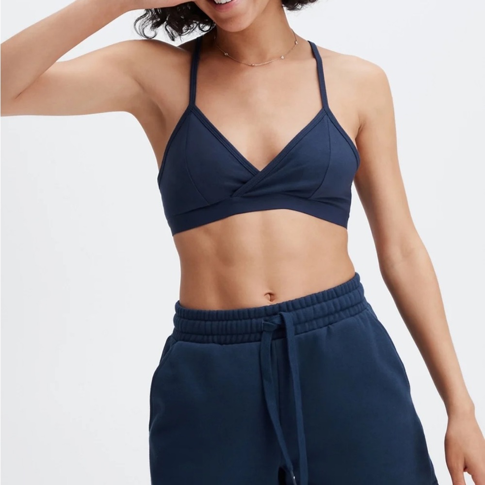 New with tags. FABLETICS the live-in racerback bralette. Deep navy. S/6